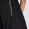 Ausgestellter Strickrock mit glitzernden Streifen Ausgestellter Strickrock mit glitzernden Streifen