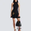Ausgestelltes Grain-de-Poudre-Kleid mit Gürtel Ausgestelltes Grain-de-Poudre-Kleid mit Gürtel