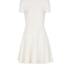 Ausgestelltes Kleid aus Krokodilstrick Ausgestelltes Kleid aus Krokodilstrick