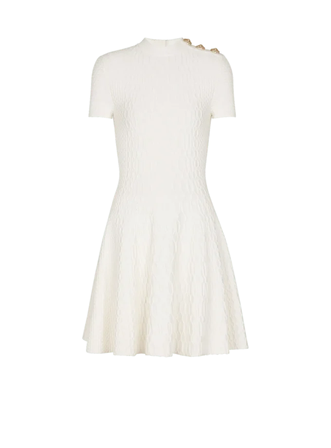Ausgestelltes Kleid aus Krokodilstrick Ausgestelltes Kleid aus Krokodilstrick