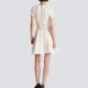 Ausgestelltes Kleid aus Krokodilstrick Ausgestelltes Kleid aus Krokodilstrick
