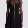 Ausgestelltes Neckholder-Kleid aus Krokodilstrick Ausgestelltes Neckholder-Kleid aus Krokodilstrick