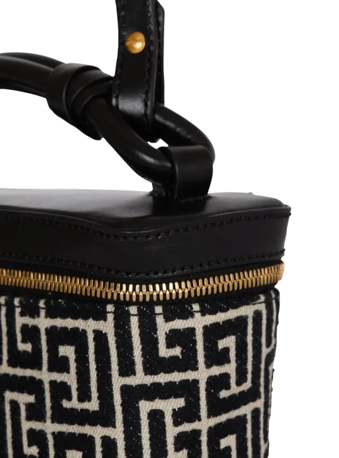 B-Army Kosmetiktasche aus Monogramm-Canvas und Leder B-Army Kosmetiktasche aus Monogramm-Canvas und Leder