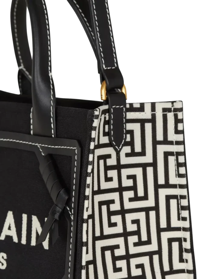 B-Army Tragetasche aus Canvas mit Monogramm und Leder B-Army Tragetasche aus Canvas mit Monogramm und Leder