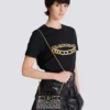 B-Buzz Kleine Handtasche mit Monogramm aus Canvas und Leder B-Buzz Kleine Handtasche mit Monogramm aus Canvas und Leder