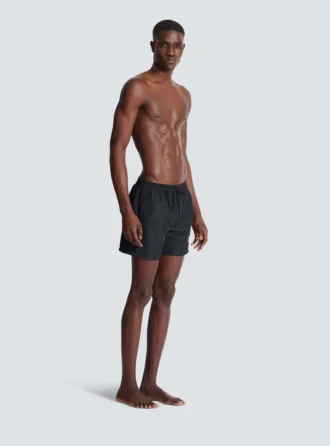 Bademode mit Balmain-Logo