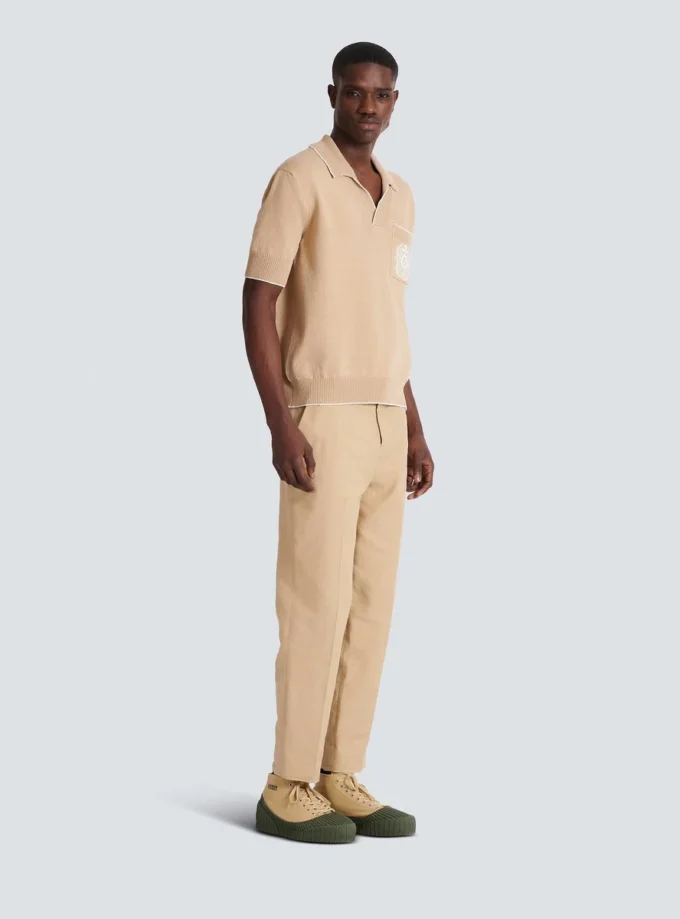 Balmain Écusson besticktes Strick-Poloshirt Balmain Écusson besticktes Strick-Poloshirt