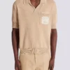 Balmain Écusson besticktes Strick-Poloshirt Balmain Écusson besticktes Strick-Poloshirt