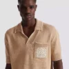 Balmain Écusson besticktes Strick-Poloshirt Balmain Écusson besticktes Strick-Poloshirt