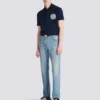 Baumwoll-Poloshirt mit Écusson-Print Baumwoll-Poloshirt mit Écusson-Print