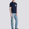 Baumwoll-Poloshirt mit Écusson-Print Baumwoll-Poloshirt mit Écusson-Print