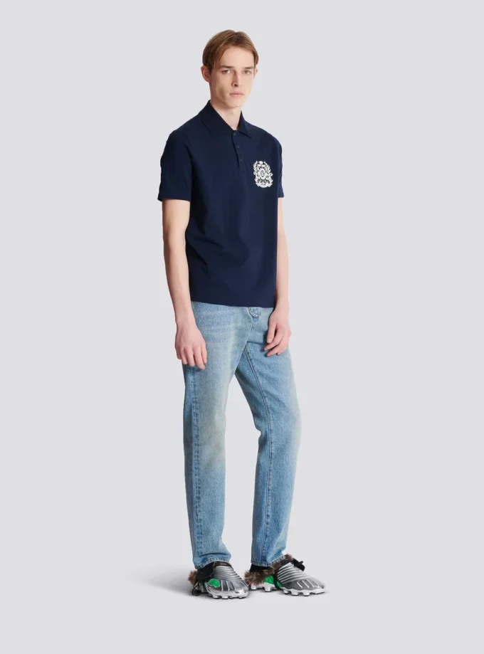 Baumwoll-Poloshirt mit Écusson-Print Baumwoll-Poloshirt mit Écusson-Print