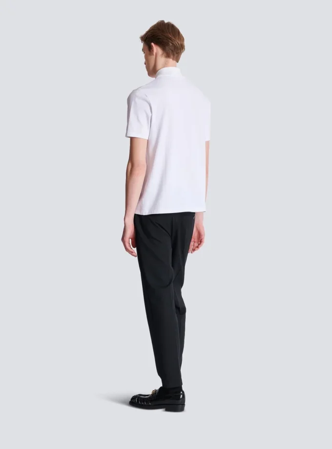 Baumwoll-Poloshirt mit Écusson-Print Baumwoll-Poloshirt mit Écusson-Print