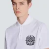 Baumwoll-Poloshirt mit Écusson-Print Baumwoll-Poloshirt mit Écusson-Print