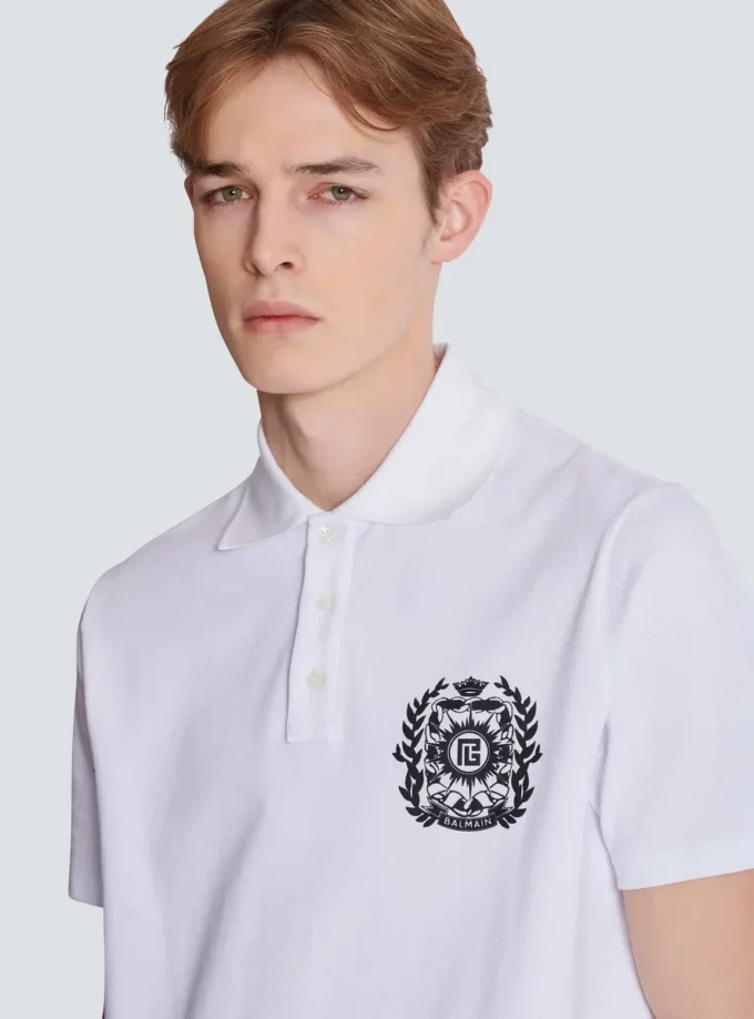 Baumwoll-Poloshirt mit Écusson-Print Baumwoll-Poloshirt mit Écusson-Print