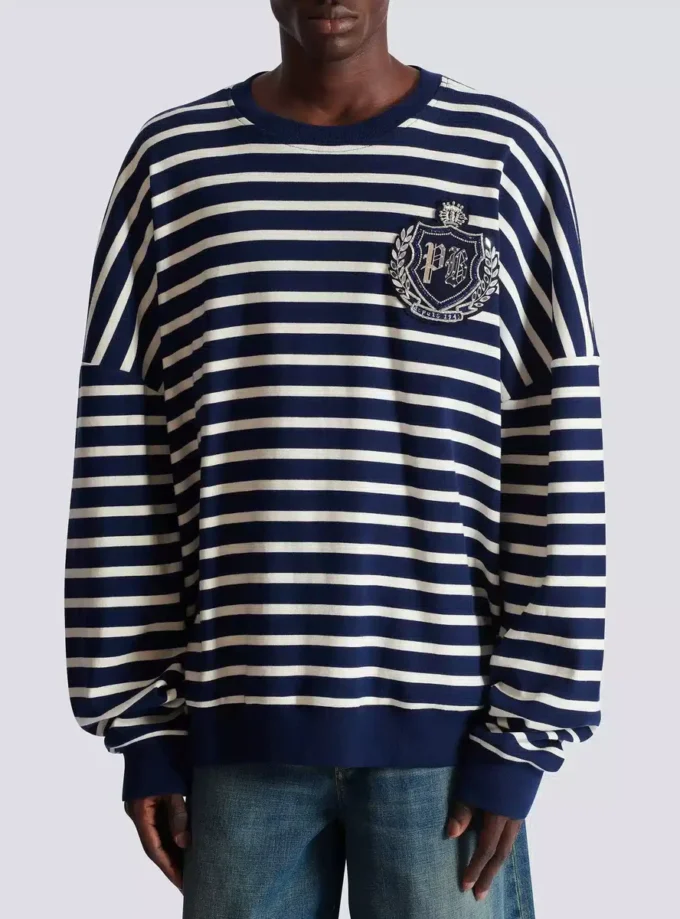 Baumwoll-Sweatshirt mit College-Emblem und bretonischen Streifen Baumwoll-Sweatshirt mit College-Emblem und bretonischen Streifen