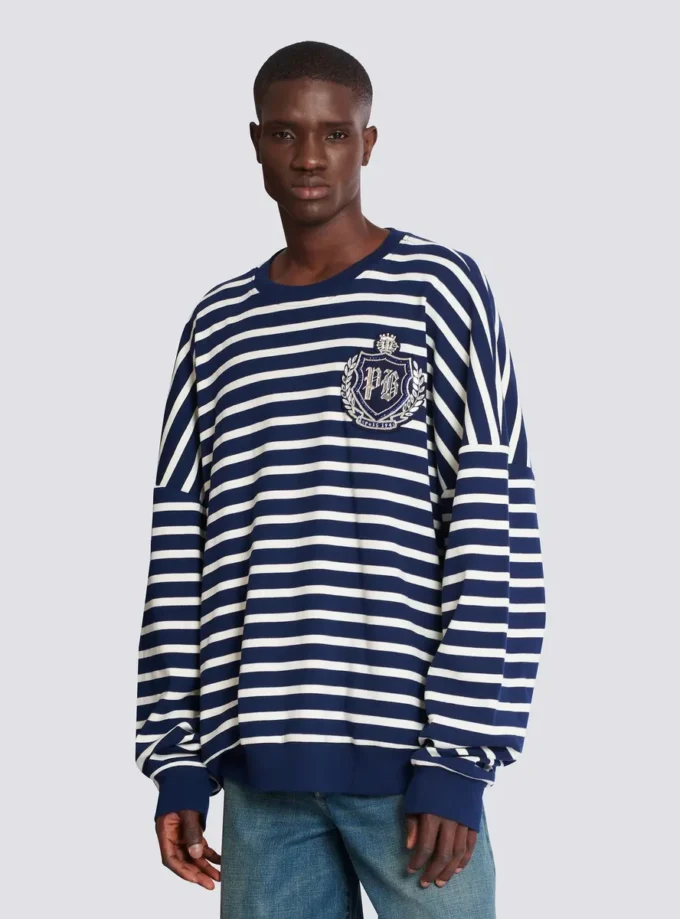 Baumwoll-Sweatshirt mit College-Emblem und bretonischen Streifen Baumwoll-Sweatshirt mit College-Emblem und bretonischen Streifen