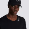Baumwollkappe mit Balmain Signature-Stickerei Baumwollkappe mit Balmain Signature-Stickerei