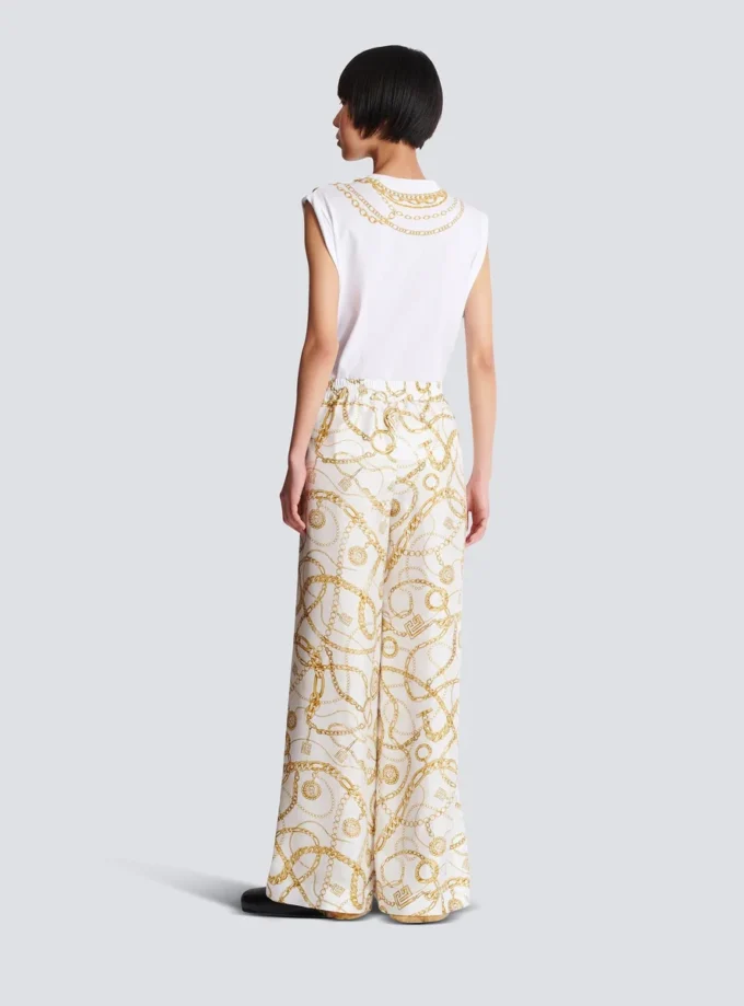 Fließende Seidenhose mit Balmain-Kettenmuster Fließende Seidenhose mit Balmain-Kettenmuster