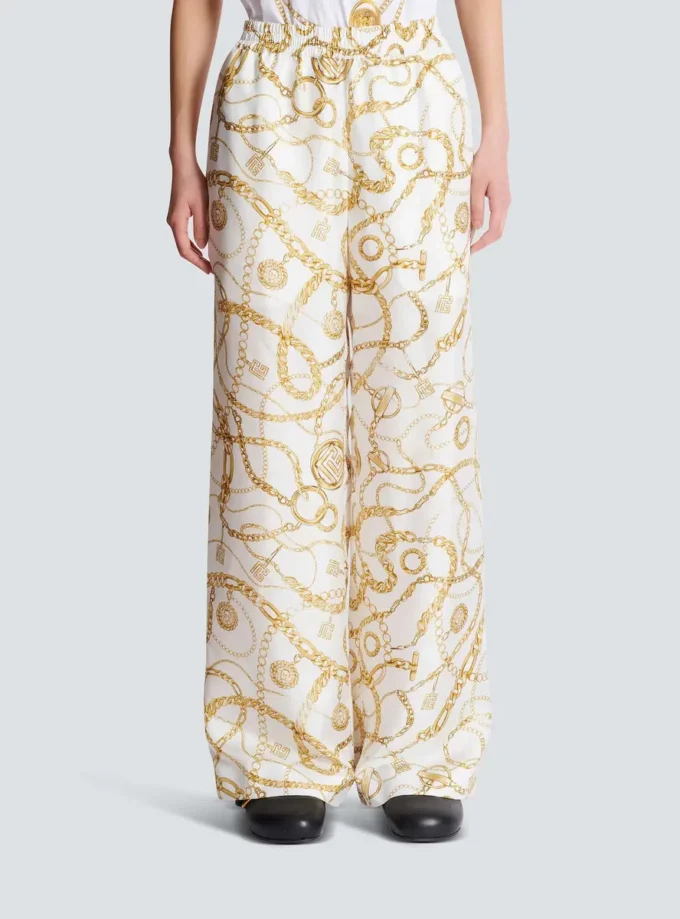 Fließende Seidenhose mit Balmain-Kettenmuster Fließende Seidenhose mit Balmain-Kettenmuster