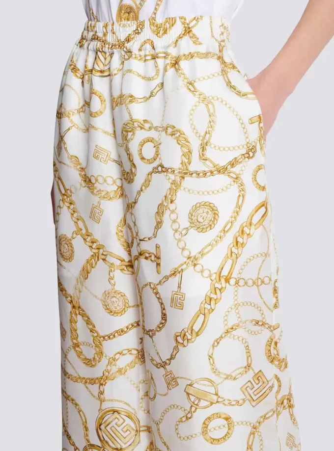 Fließende Seidenhose mit Balmain-Kettenmuster Fließende Seidenhose mit Balmain-Kettenmuster