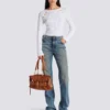Gerade geschnittene Jeans aus verwaschenem Denim Gerade geschnittene Jeans aus verwaschenem Denim