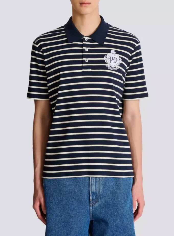 Gestreiftes Polohemd mit College-Emblem Gestreiftes Polohemd mit College-Emblem