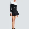 Hoch taillierter Rock mit Grain de Poudre-Muster Hoch taillierter Rock mit Grain de Poudre-Muster
