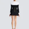Hoch taillierter Rock mit Grain de Poudre-Muster Hoch taillierter Rock mit Grain de Poudre-Muster