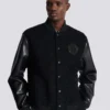 Jacke aus Varsity-Tweed und Kunstleder Jacke aus Varsity-Tweed und Kunstleder