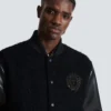Jacke aus Varsity-Tweed und Kunstleder Jacke aus Varsity-Tweed und Kunstleder