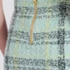 Kurzer Rock aus glitzerndem Tweed mit Karomuster Kurzer Rock aus glitzerndem Tweed mit Karomuster
