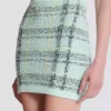 Kurzer Rock aus glitzerndem Tweed mit Karomuster Kurzer Rock aus glitzerndem Tweed mit Karomuster