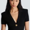 Kurzes ausgestelltes Strickkleid Kurzes ausgestelltes Strickkleid