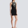 Kurzes Kleid mit Sternenstickerei Kurzes Kleid mit Sternenstickerei