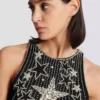 Kurzes Kleid mit Sternenstickerei Kurzes Kleid mit Sternenstickerei