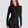 Kurzes Paillettenkleid aus Krokodilstrick Kurzes Paillettenkleid aus Krokodilstrick