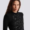 Kurzes Paillettenkleid aus Krokodilstrick Kurzes Paillettenkleid aus Krokodilstrick