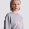 Kurzes Sweatshirt aus bedruckter Baumwolle Kurzes Sweatshirt aus bedruckter Baumwolle