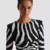 Kurzes zweifarbiges Zebra-Paillettenkleid Kurzes zweifarbiges Zebra-Paillettenkleid