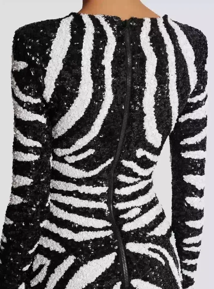 Kurzes zweifarbiges Zebra-Paillettenkleid Kurzes zweifarbiges Zebra-Paillettenkleid