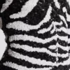 Kurzes zweifarbiges Zebra-Paillettenkleid Kurzes zweifarbiges Zebra-Paillettenkleid