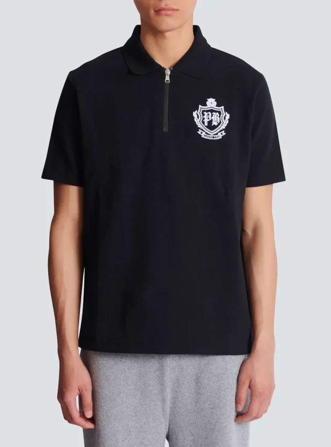 Kurzärmeliges Polohemd mit College-Emblem Kurzärmeliges Polohemd mit College-Emblem