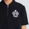 Kurzärmeliges Polohemd mit College-Emblem Kurzärmeliges Polohemd mit College-Emblem