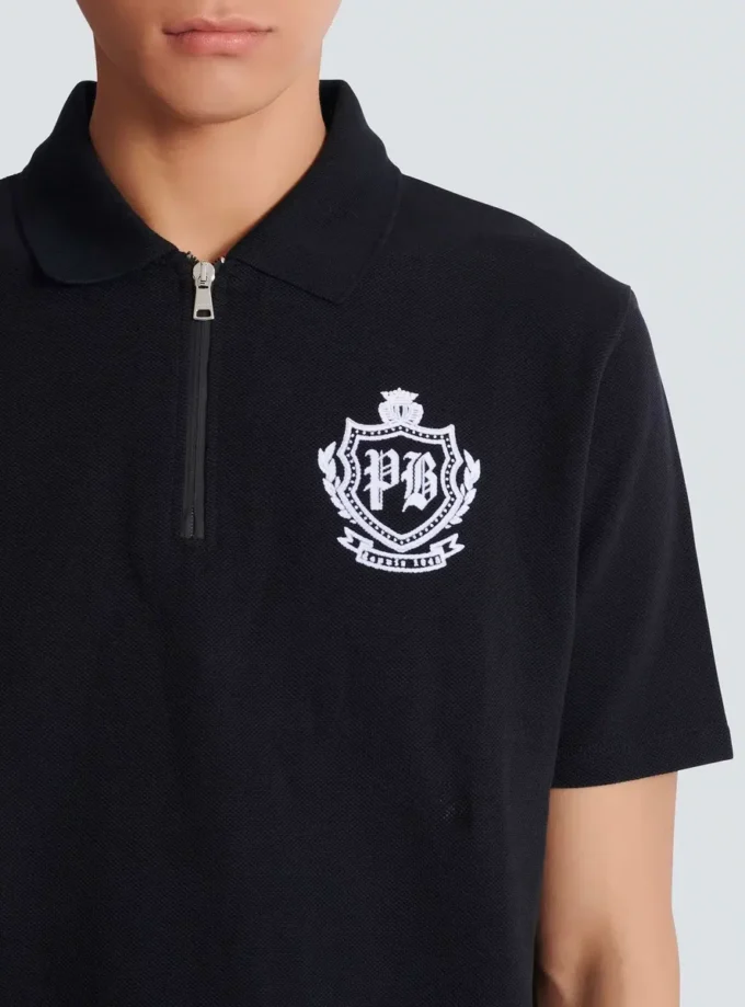 Kurzärmeliges Polohemd mit College-Emblem Kurzärmeliges Polohemd mit College-Emblem