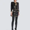 Lammfelljacke mit Kettenbesatz Lammfelljacke mit Kettenbesatz