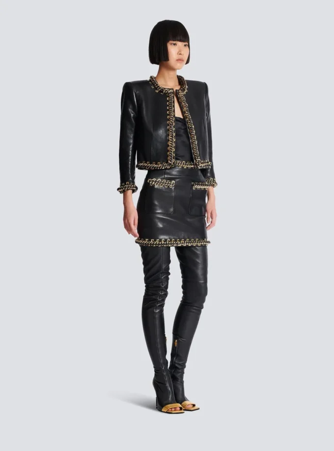 Lammfelljacke mit Kettenbesatz Lammfelljacke mit Kettenbesatz