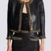 Lammfelljacke mit Kettenbesatz Lammfelljacke mit Kettenbesatz