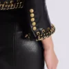 Lammfelljacke mit Kettenbesatz Lammfelljacke mit Kettenbesatz