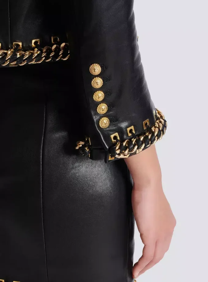 Lammfelljacke mit Kettenbesatz Lammfelljacke mit Kettenbesatz